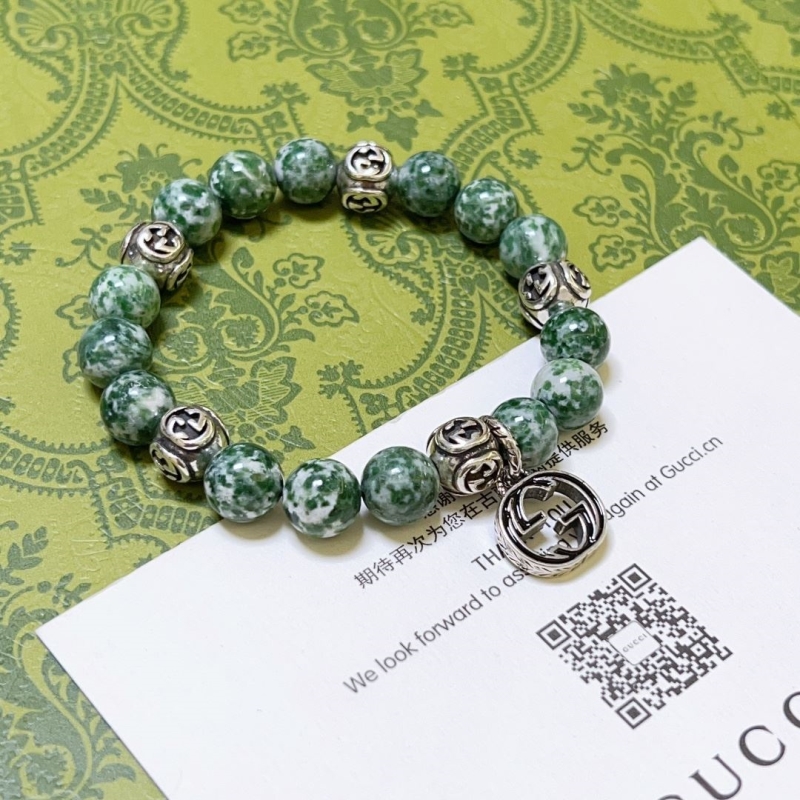 G*u*i bracelets